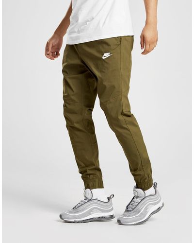 olive green nike track pants