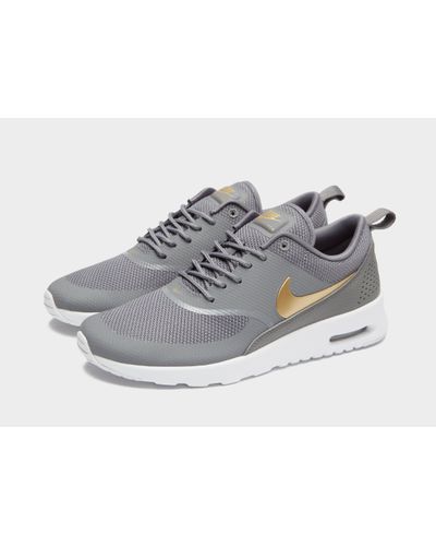 nike air max thea womens grey and gold