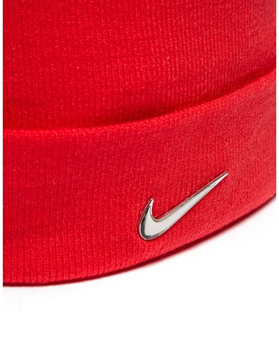 white nike hat with red swoosh