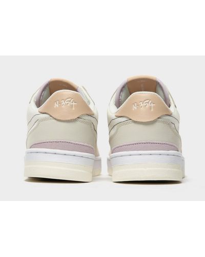 nike squash type sneakers in sail and iced lilac