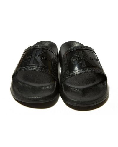 calvin klein criss cross slides