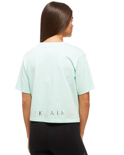 mint green nike shirt