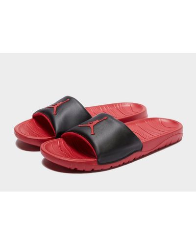 red nike air slides