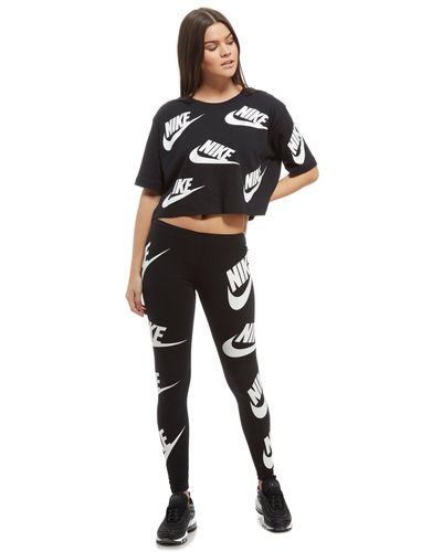 nike all over logo print tracksuit in camel