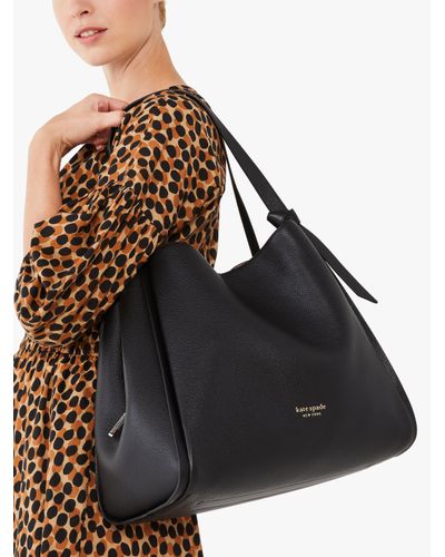large black leather shoulder bolsa