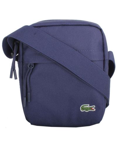 lacoste vertical camera bolsa