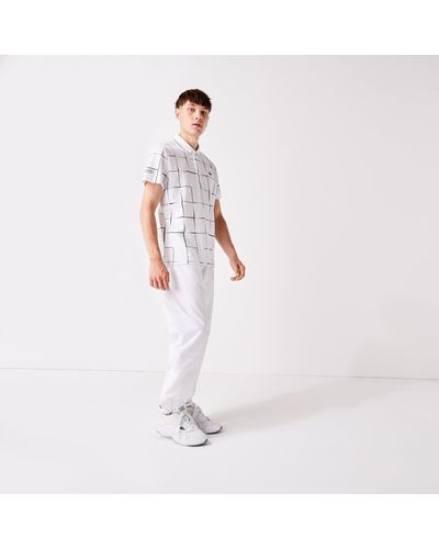 lacoste track pants white