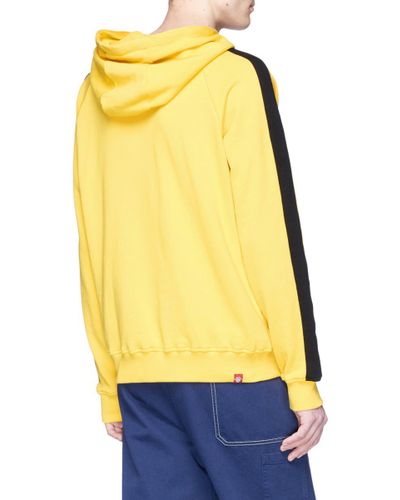 bruce lee yellow sweatshirt