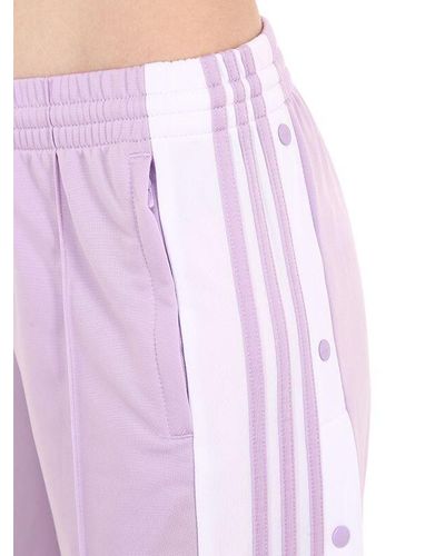 adibreak track pants purple