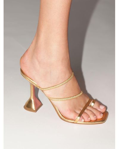 amina muaddi gold sandals