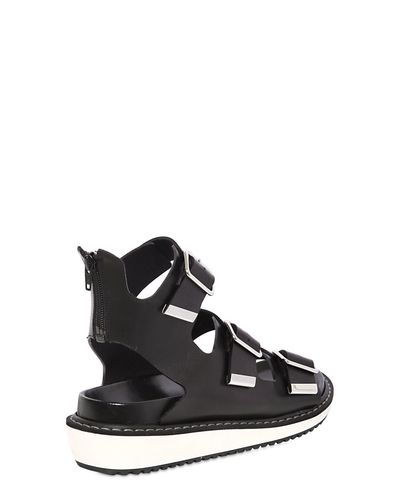 Givenchy Belted Leather Sandals in Black for Men - Lyst