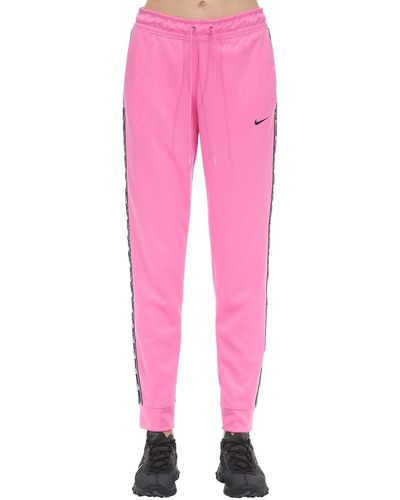 Nike Jogger Logo Tape Sweatpants in Pink - Lyst