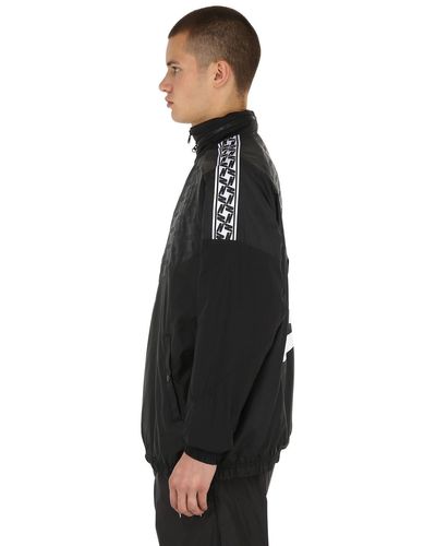 nike nsw taped track jacket
