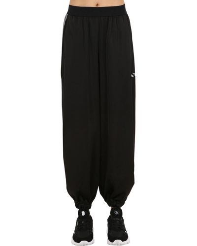 adidas Originals Balloon Leg Techno Track Pants in Black | Lyst Australia