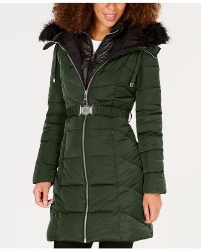 green coat black fur hood