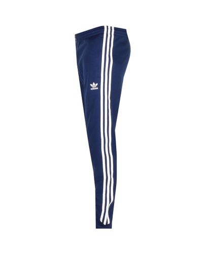adidas originals superstar track pants blue