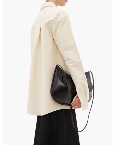 jil sander crescent crossbody bolsa