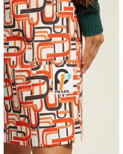 prada orange skirt