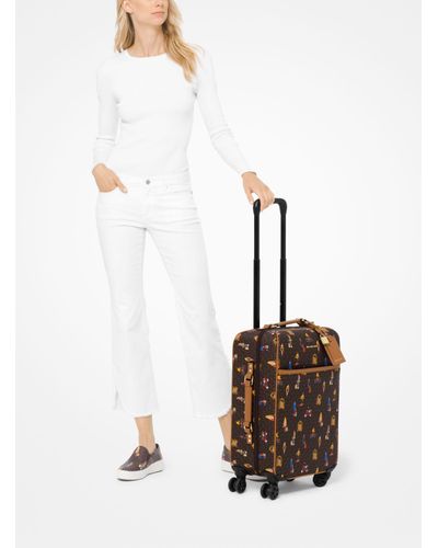 Valigia Bedford Travel Extra-Large Con Stampa Jet set girls di Michael Kors  in Marrone | Lyst
