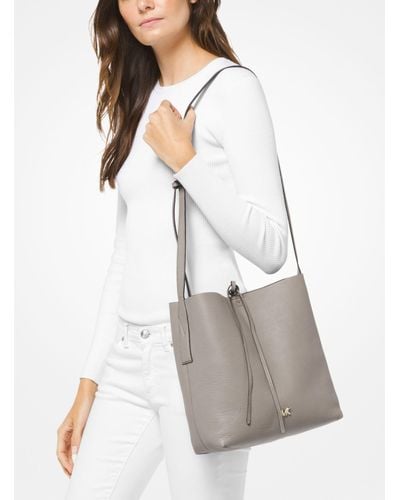 junie large pebbled leather messenger