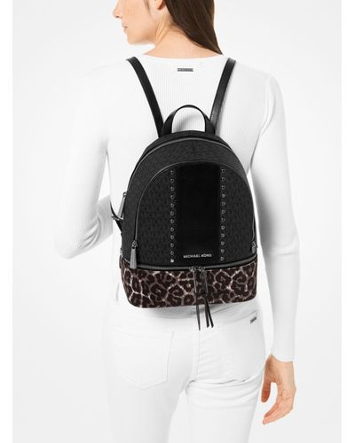 michael kors black cheetah backpack