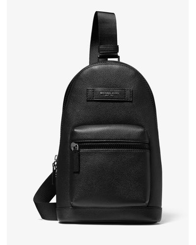 coach sling backpacks