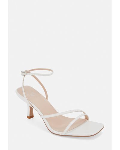 white barely there sandals low heel