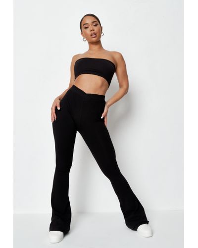 Missguided Black Cross Waistband Jersey Flares - Lyst