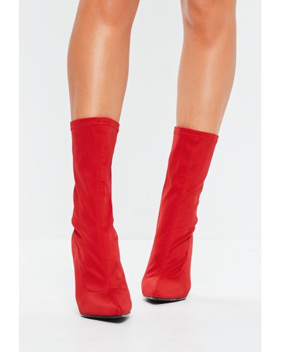 red heeled sock boots