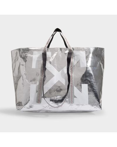 Off-White c/o Virgil Abloh Arrows Tote Bag In Silver And White Pvc - Metallic