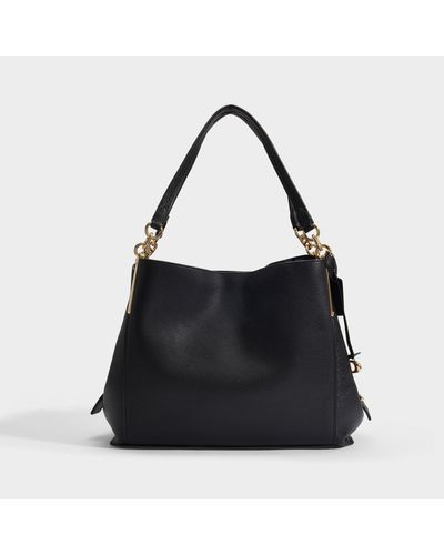 wide strap crossbody bolsa