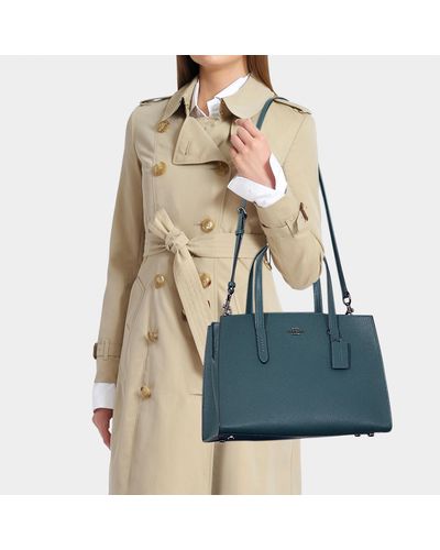 coach polished pebble leather charlie carryall