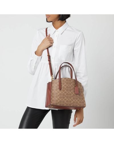 coach carryall in signature canvas