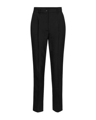 Dolce & Gabbana Exclusivo en Mytheresa – pantalones ajustados de tiro alto - Negro