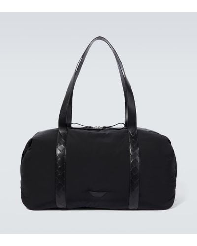 Bottega Veneta Leather-trimmed Duffle Bags - Black