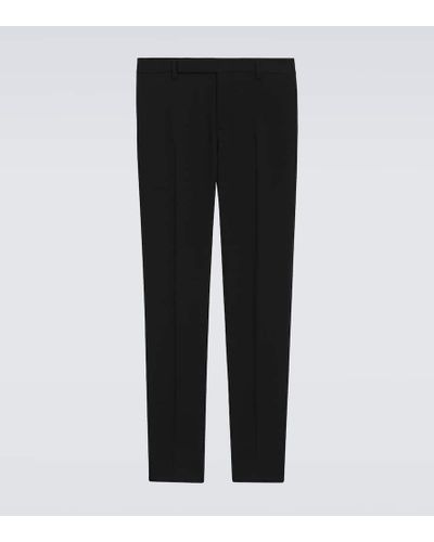 Saint Laurent Pantalones slim en gabardina de lana - Negro