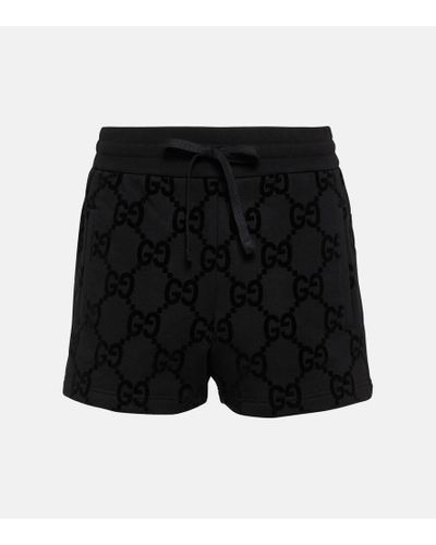 Gucci Shorts de forro polar de algodon con GG - Negro