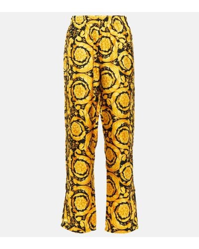 Versace Pantalones Barocco de seda de tiro alto - Amarillo