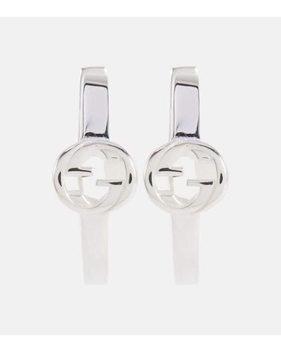 Gucci Orecchini a cerchio Interlocking G in argento sterling - Bianco