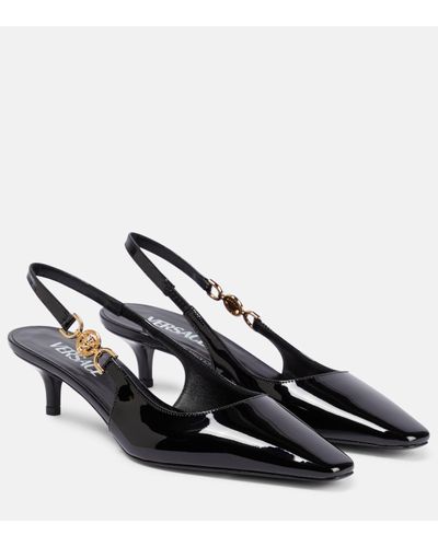 Versace Chaussures à petit talon noires à bride arrière à méduse '95