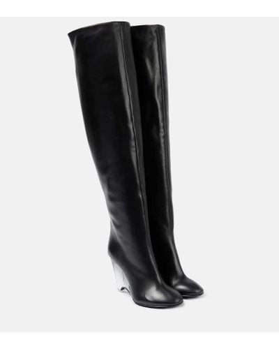 Alaïa Botas altas de piel - Negro