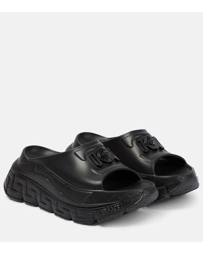 Versace Mules Trigreca en caoutchouc - Noir