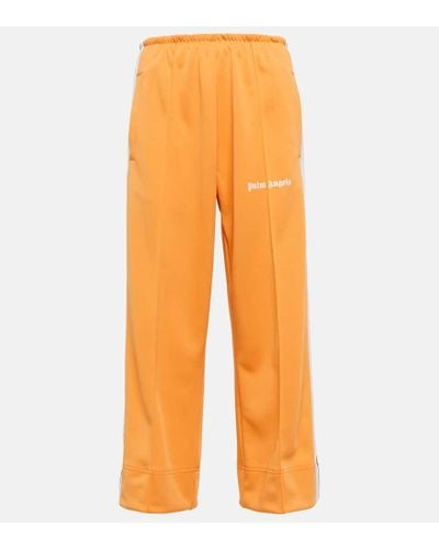 Palm Angels Pantalones deportivos cropped - Naranja