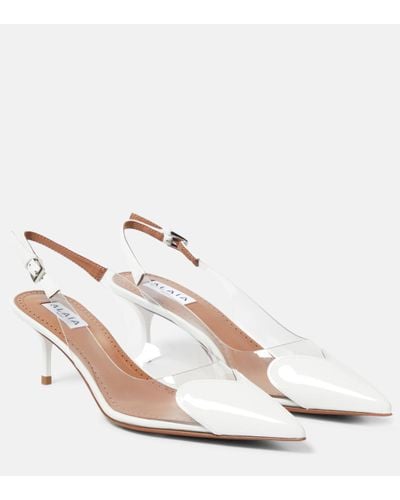 Alaïa Alaïa chaussures à petit talon blanches à bride arrière et à découpe graphique