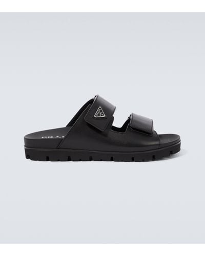 Prada Mules Vit Sport en cuir - Noir