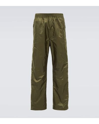 Prada Pantaloni con placca logo - Verde