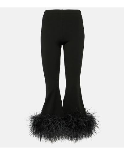 Valentino Pantalones flared de tiro alto con plumas - Negro