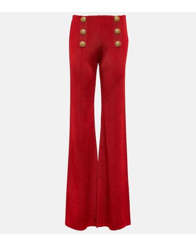 Balmain Pantalones flared de punto con tiro alto - Rojo