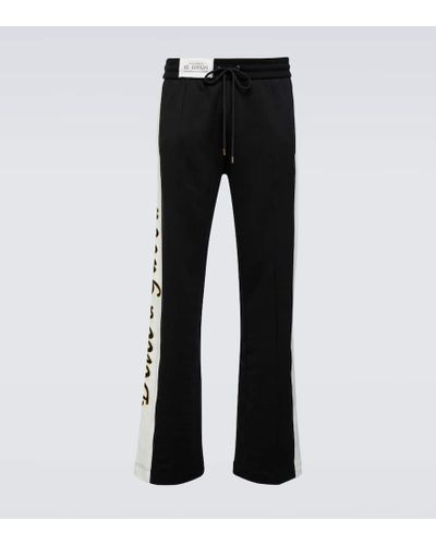 Dolce & Gabbana Pantalones deportivos bordados - Negro