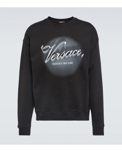 Versace Felpa in jersey di cotone con stampa - Nero
